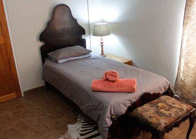 WARTHOG-PARADISE-room-bed