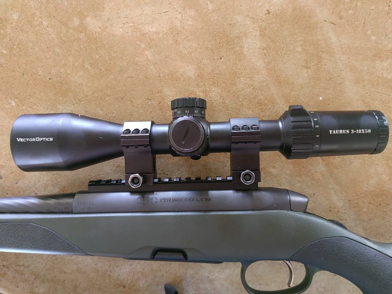 Photograph of a VectorOptics Taurus 3-18x50 rifle scope.