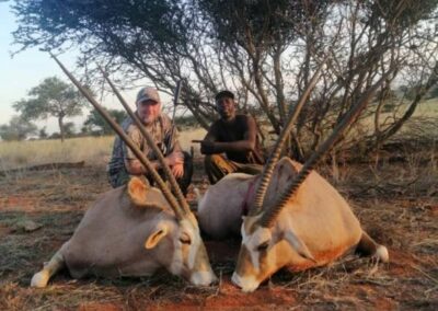 Hunters with their prizes