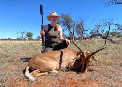 A hunter with her prize