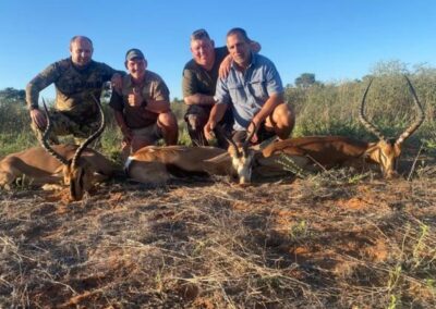 Hunters with their prize